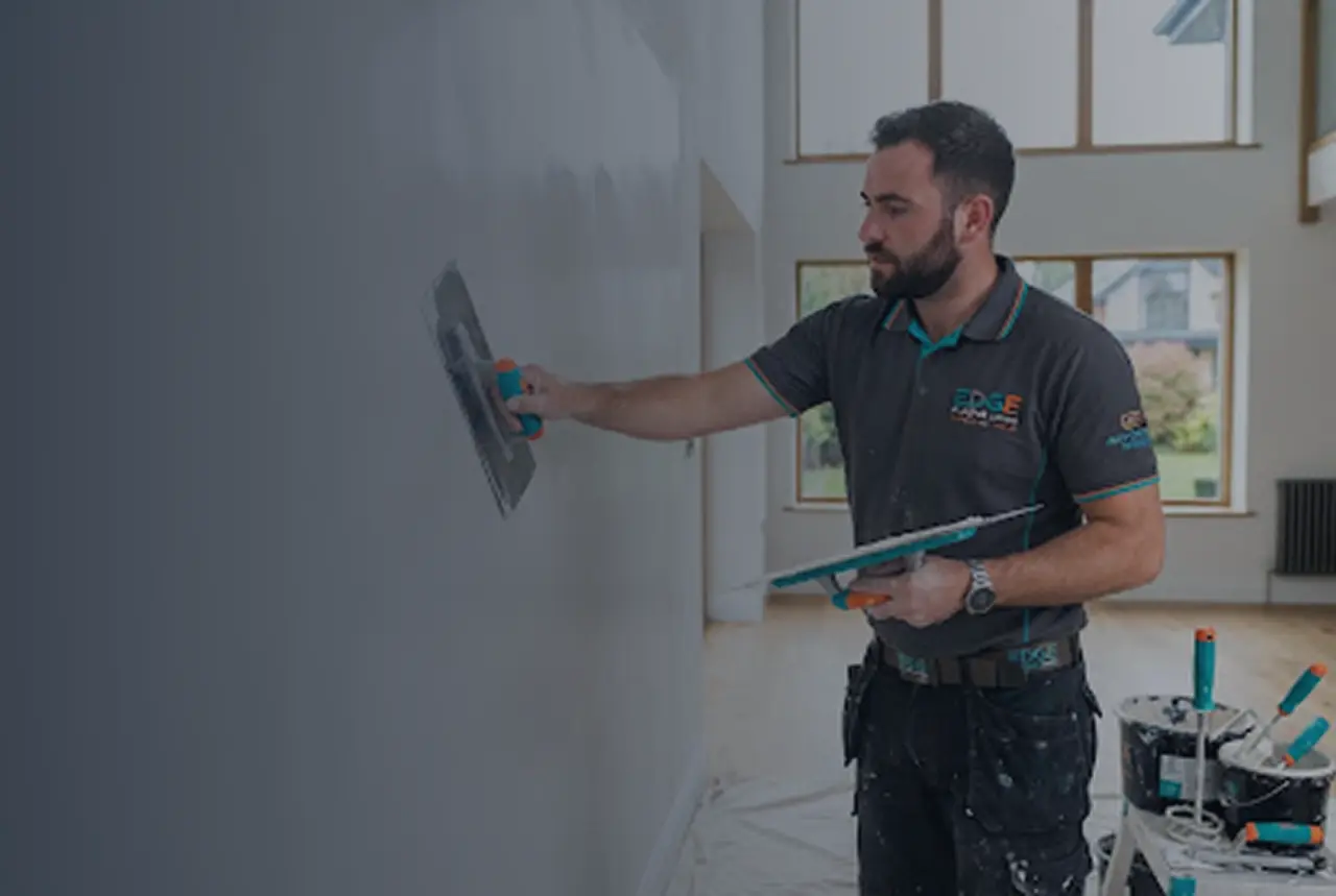 Professional plasterer applying plaster for residential and commercial plastering services in Melbourne